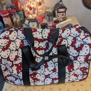 Hello Kitty Rolling Duffel Bag - Red and Black